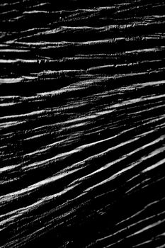 Wooden texture in black and white with light and shadows effects