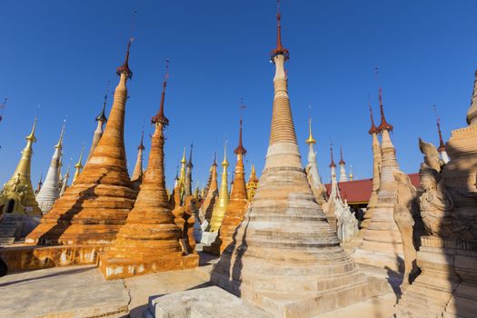 Ruins of ancient Burmese Buddhist pagodas Nyaung Ohak in the village of Indein on Inlay Lake in Shan State, Myanmar, Burma)