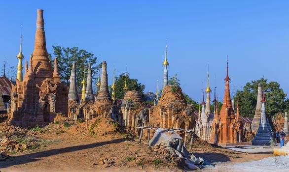 Ruins of ancient Burmese Buddhist pagodas Nyaung Ohak in the village of Indein on Inlay Lake in Shan State, Myanmar, Burma)