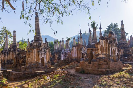 Ruins of ancient Burmese Buddhist pagodas Nyaung Ohak in the village of Indein on Inlay Lake in Shan State, Myanmar, Burma)