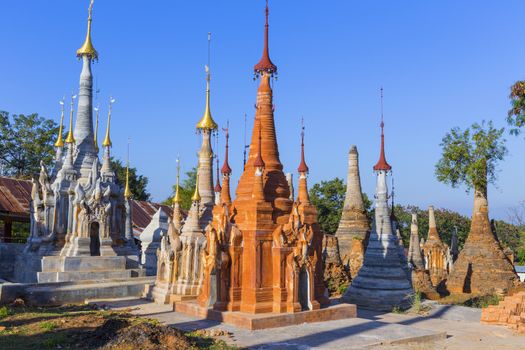 Ruins of ancient Burmese Buddhist pagodas Nyaung Ohak in the village of Indein on Inlay Lake in Shan State, Myanmar, Burma)