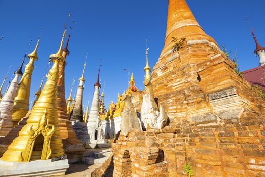 Ruins of ancient Burmese Buddhist pagodas Nyaung Ohak in the village of Indein on Inlay Lake in Shan State, Myanmar, Burma)