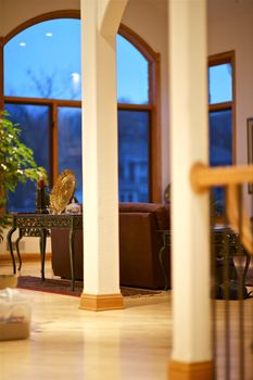 Big Living Room Windows and Sofa. Hardwood Floor. Fancy Home Interiors