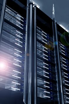 Modern Data Center with Lens Flare. Servers Racks - Dark Metal, Glass and Chrome Elements Racks. Elegant Modern Data Center. Hosting Theme 3D Render Illustration. 