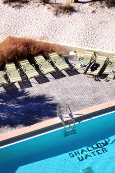 Shallow Water Hotel Pool. Top View. Florida, USA. Vertical Photo