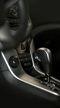 Driving Console - Modern Vehicle Interior Design. Central Console / Dashboard. Automatic Transmission Stick Shift. Transportation Photo Collection.