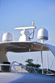 Boating: Navigation Equipment. Navi Instrument on the Top of the Motorboat. Vertical Photography. GPS and Radar.