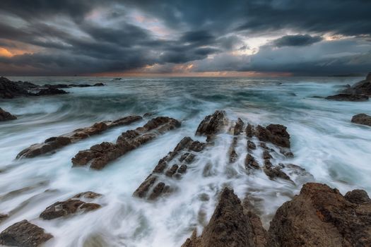 Waves and foam in the Cantabrico sea, in Bermeo