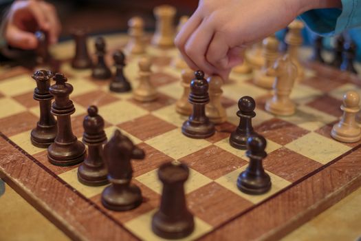 Two kids playing chess