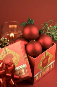 Christmas Elements. Christmas Decoration and Gift Box. Burgundy Background