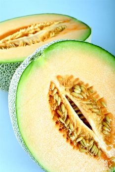 Cantaloupe Fruit Vertical Closeup Photo. Fresh Open Cantaloupe. Food Photo Collection