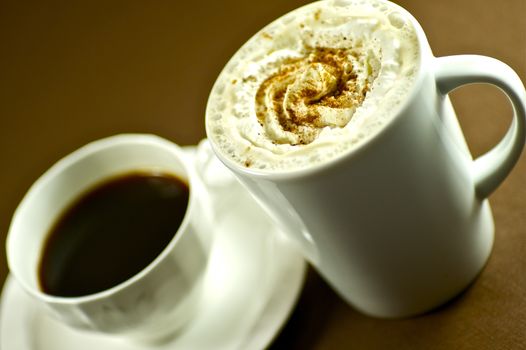 Tasty Coffee White Cups. Large Cup and Small Cup of Coffee