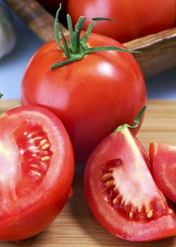 Fresh Tomatoes - Vertical Closeup Photography. Fresh Tasty and Juicy Tomatoes.