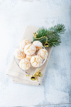 Almonds Cookies Macaroon snowy peaks on a wooden surface