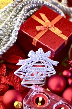 Holiday Ornaments. Red Present Box, Silver Bell Ornament and Some Candles. Holidays Photo Collection