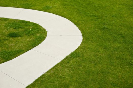Backyard Sidewalk. Green Fresh Cut Grass