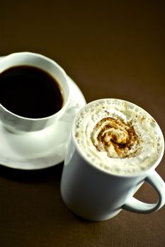 Coffee Break. Two Fresh Coffee Caps - Dark Brown Background.