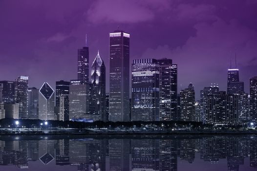 Chicago Lake Front - Chicago Skyline with Lake Michigan. Purple Dark Sky. Panoramic Photography.
