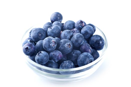 Small Glass Bowl with Fresh Blueberries. Blueberries Isolated on White Horizontal Photo.