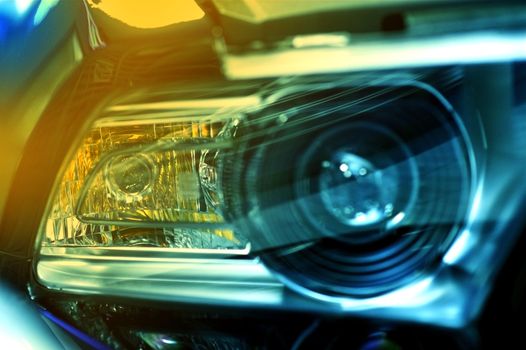 Car Headlight. Performance Car Headlight Close Out. Yellow-Bluish Light.