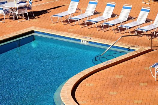 Public Pool. Crystal Clear Water in the Hotel Pool. Florida, USA.