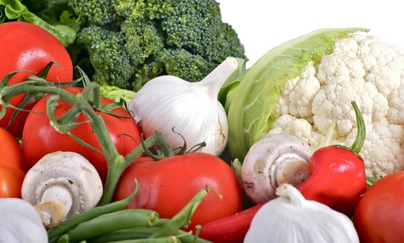 Vegetables Pile. Tomatoes, Broccoli, Mushrooms, Garlic, Green Beans and Cauliflower. Vegetables Dite Mix Horizontal Photo.