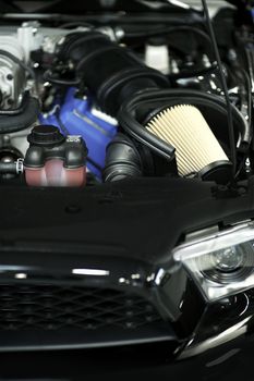 Sport Vehicle Air Filter - Muscle Car Under the Hood. Performance Engine.