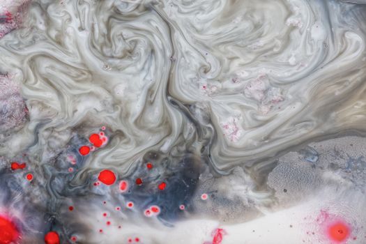 Abstract background created from milk and synthetic color