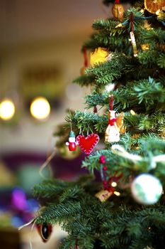 Christmas Tree Closeup. Vertical Christmas Tree Decoration Closeup Photo. Seasonal Theme.