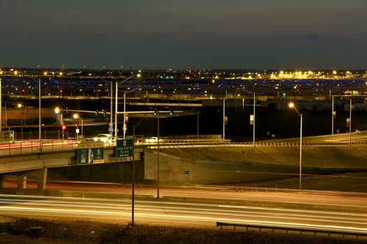 Airport and Highway Traffic Long Exposure Photography. Chicago O\'Hare International Airport and Highway I-294