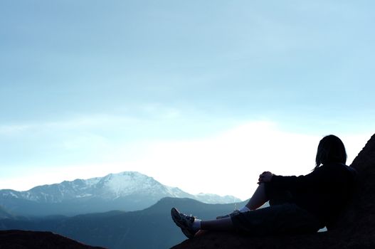 Female on the Rocks - Rocky Mountains. Great Copy Space - Colorado Theme