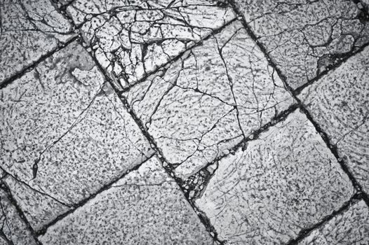 Cracked Bricks Background - Horizontal B/W Photography. Cracked Concrete Bricks