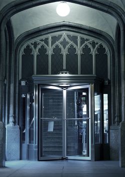 The Entrance - Chicago Architecture. Entrance with Glass Rotating Door. The Entrance - Vertical Photography.