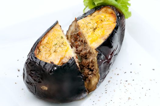 close  up view of nice yummy baked eggplant  on white back