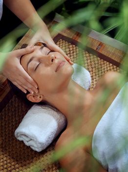 portrait of young beautiful woman in spa environment