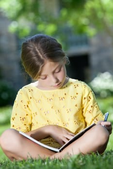 portrait of happy girl having good time in summer environment