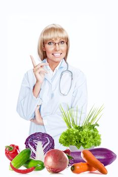 Portrait of nice doctor gesturing  and smiling on white  back