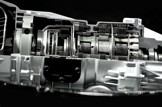 Automatic Transmission / Gearbox Section. Inside Modern Automatic Transmission. Cars Technology. Black Solid Background.