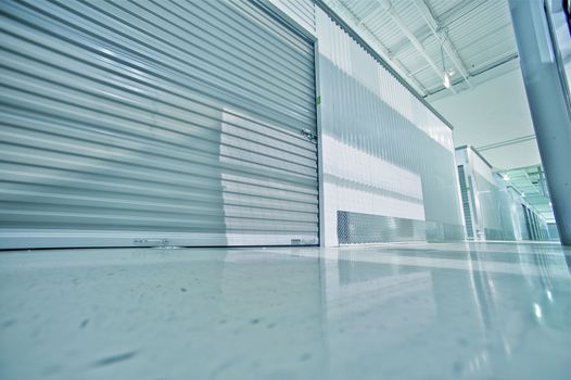 Storage Facility - Storage Hallway. Storage Lockers - Units. Wide Angle Floor Level Photography.