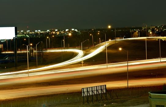 City in Motion. Urban Long Exposure High Traffic Area. Highway Ramp Near O\'Hare International Airport in Chicago, IL, USA.