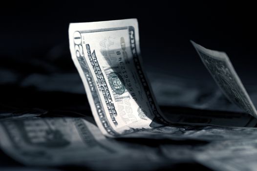 American Dollars in Dark Studio Photography. Business / Money Theme.