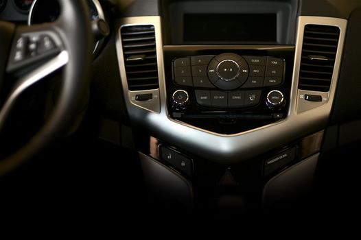 Dark Car Dashboard Horizontal Studio Photography. Modern Car Interior Design.