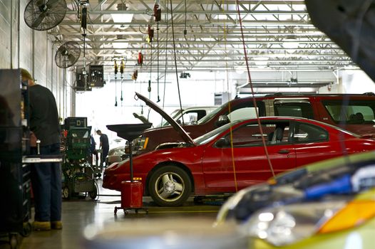 Vehicles Repair. Authorized Car Service. Auto Service Workers