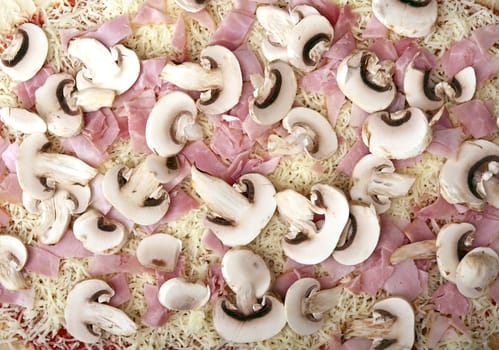 Raw Pizza Ready for Baking. Raw Pizza Ingredients Like Cheese, Ham and Mushrooms. Horizontal Closeup Photo.