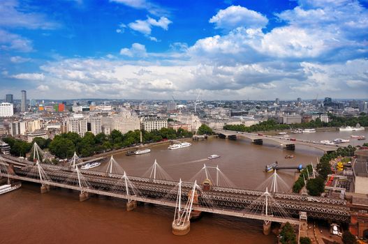 City of London - Bird View. Thames River. Sunny Cloudy Day in London, UK (United Kingdom) Horizontal Photo.