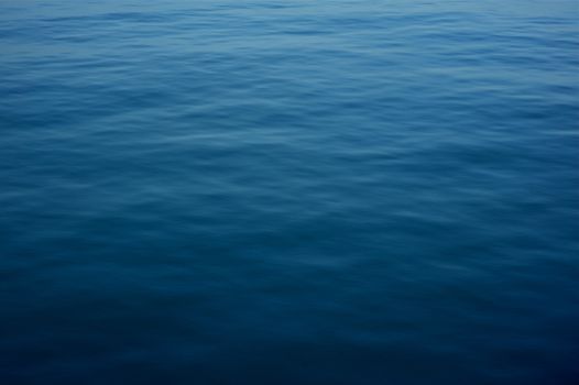 Deep Blue Water Surface Background. Horizontal Natural Water Surface Photography.