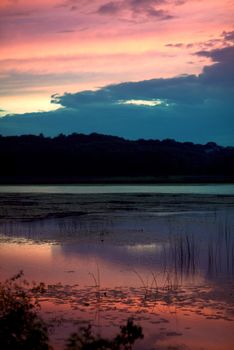 Sunset Lake - Grass Lake at Sunset. Grass Lake is Located in Northwestern Lake County. Chain O\'Lakes State Park Grass Lake in Summer. Vertical Photography
