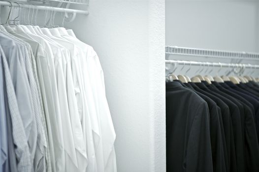 In the Men\'s Closet. Rows of Men\'s Apparel. Walk-In Closet