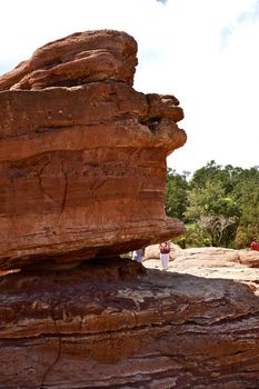 Balanced Rock is a Rock Formation in the Garden of the Gods in Colorado Springs, Colorado, USA. Balanced Rock Vertical Photo
