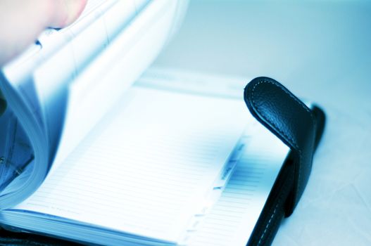 Browsing Note Book - Calendar / Scheduler. Horizontal Business Theme Photo.